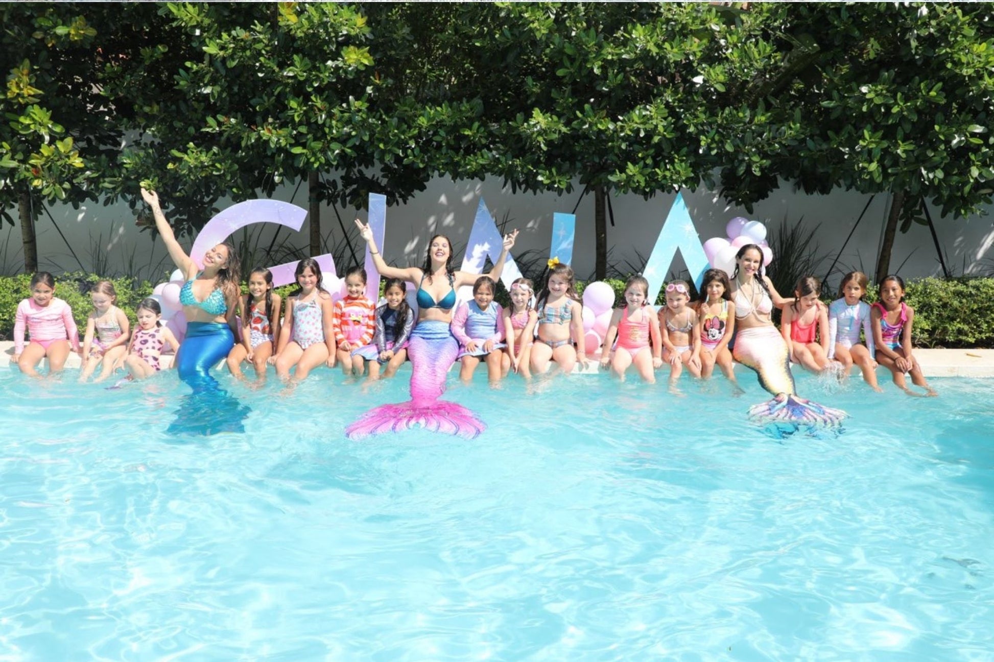 Mermaid gathering kids party school mermaid swimming pool. miami